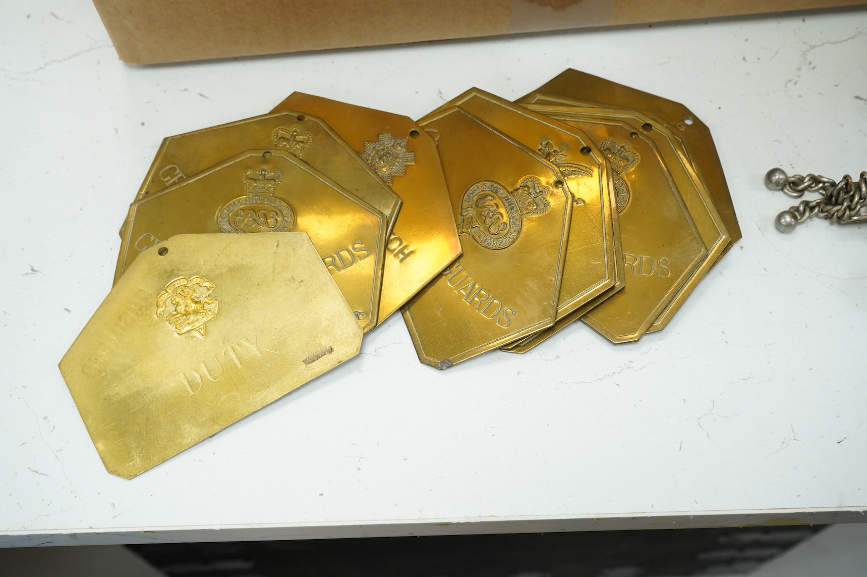 A collection of militaria, etc. including; a Gordon Highlander’s kilt and sporran, three early 20th century Union Flags, a Victorian beaded ‘sweetheart’s’ cushion, two empty First World War Princess Mary Christmas tins,